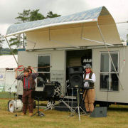 The Mangledwurzels play on as high winds totally wreck the stage behind and above them at the Mid Somerset Show, Shepton Mallet (20 Aug 2006)