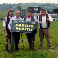 The Mangledwurzels with Rich Clothier outside Wyke Farms' main cheese factory in Bruton.